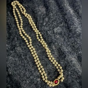 Beautiful Custom Pearl Necklace with a Ruby Stone.